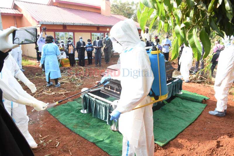 Men in white during Papa Shirandula's burial 