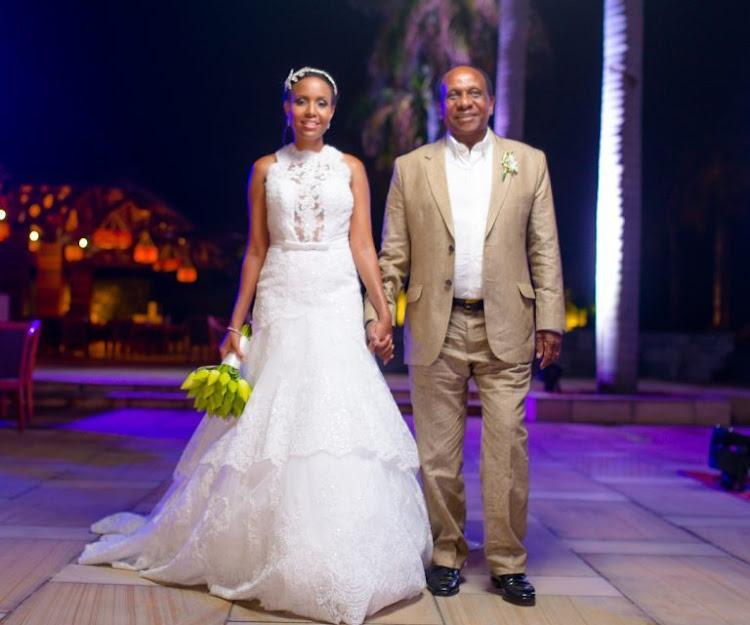 Reginald Mengi with his wife Jacqueline Ntuyabaliwe during their wedding in Mauritius