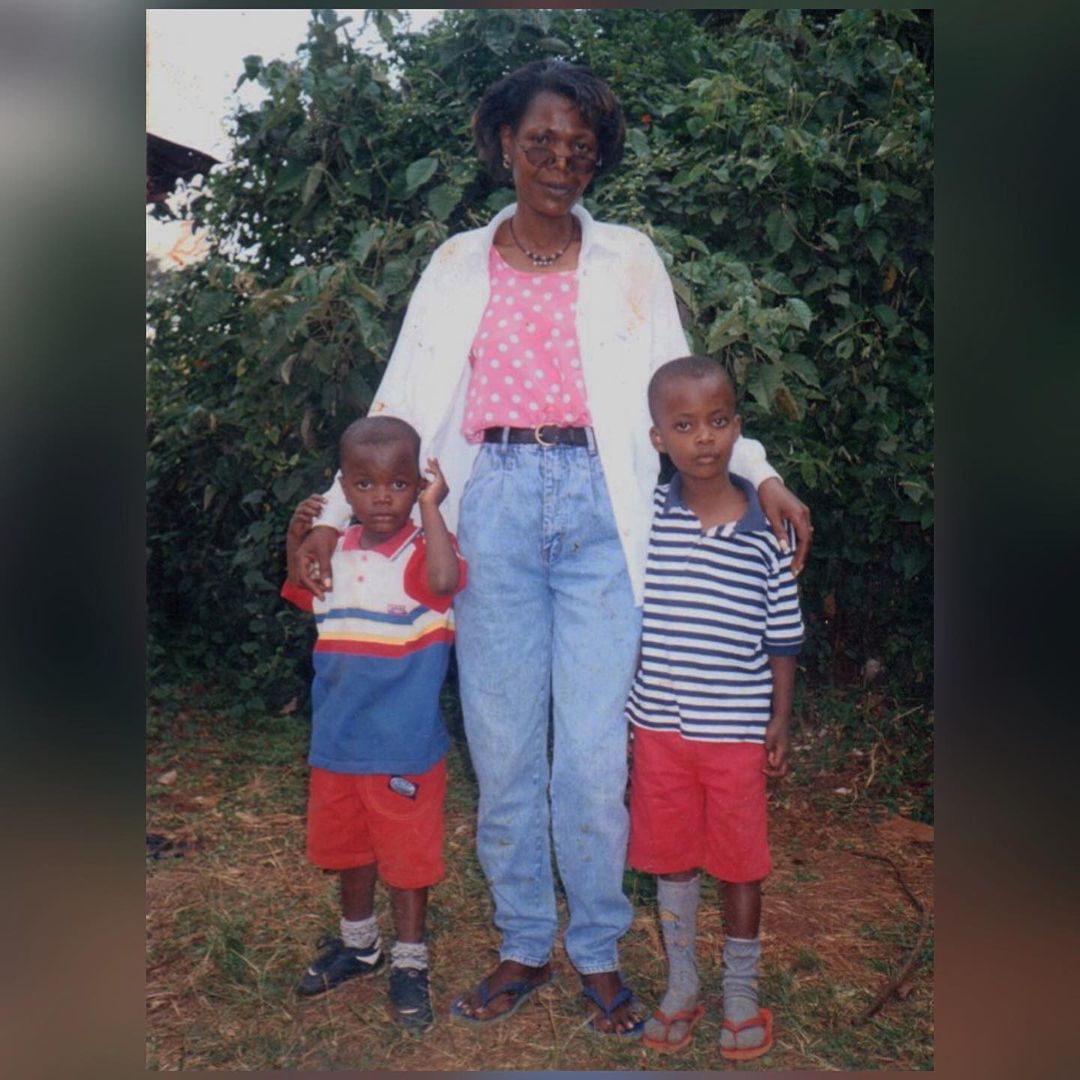 A young Baha (left) with his mother and brother. 