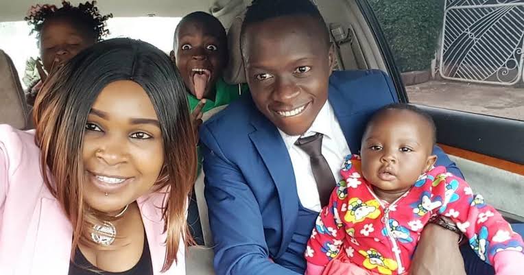 Obinna with his baby mama and his kids